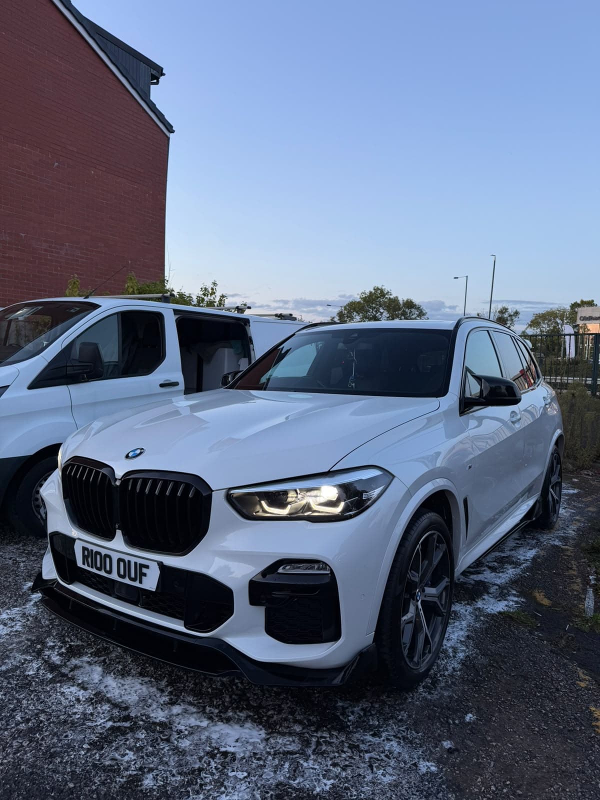 White BMW X5 with gleaming paintwork after valeting